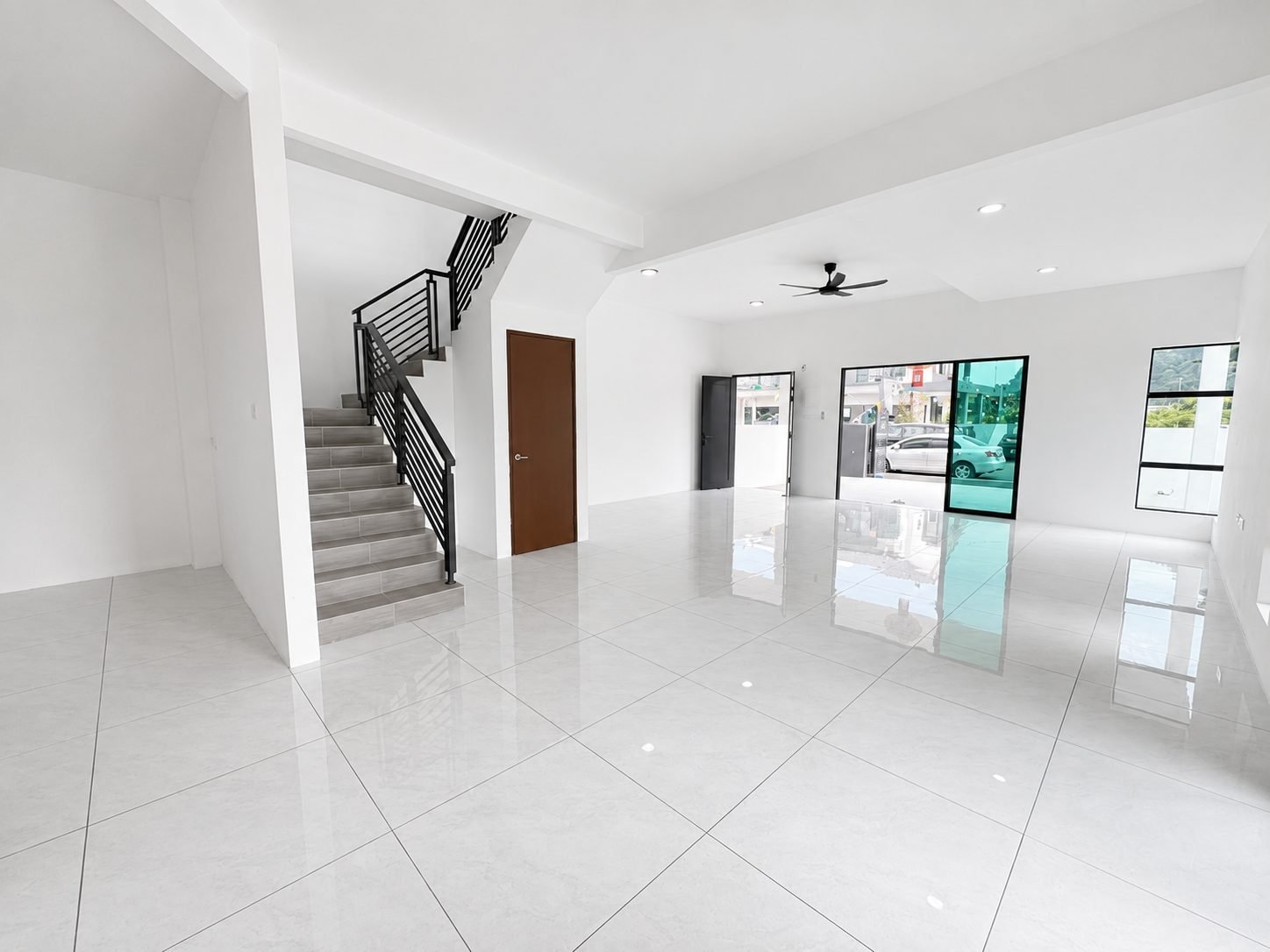 Living area looking towards the staircase, Ampang Cove semi-detached
