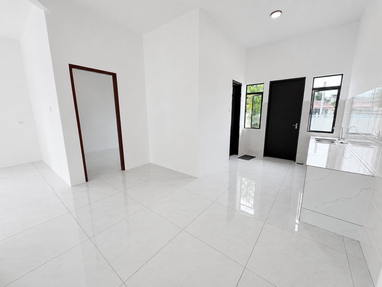Ground-floor bedroom beside the kitchen, Ampang Cove semi-detached