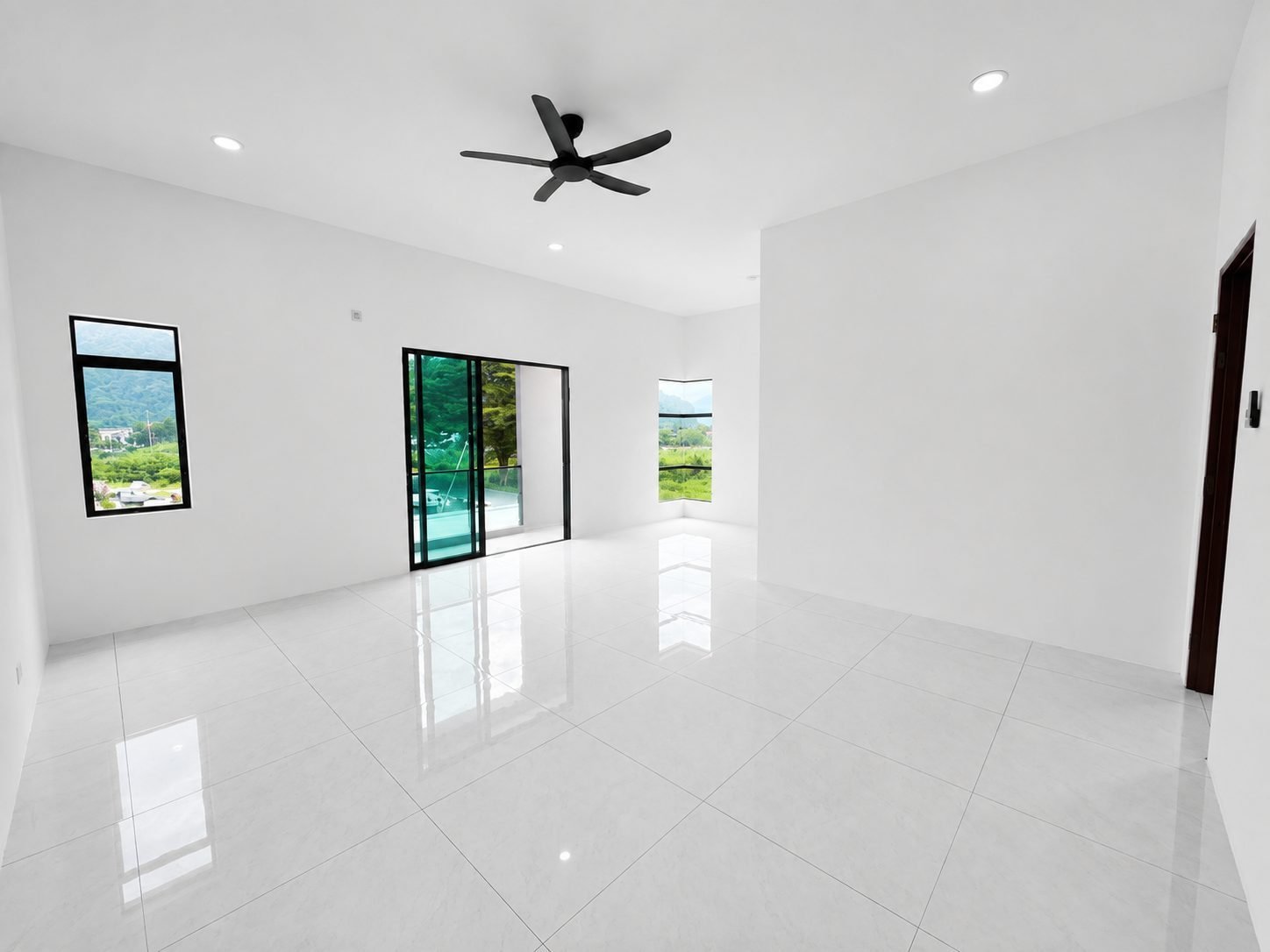 First-floor family area opening onto the balcony, Ampang Cove semi-detached