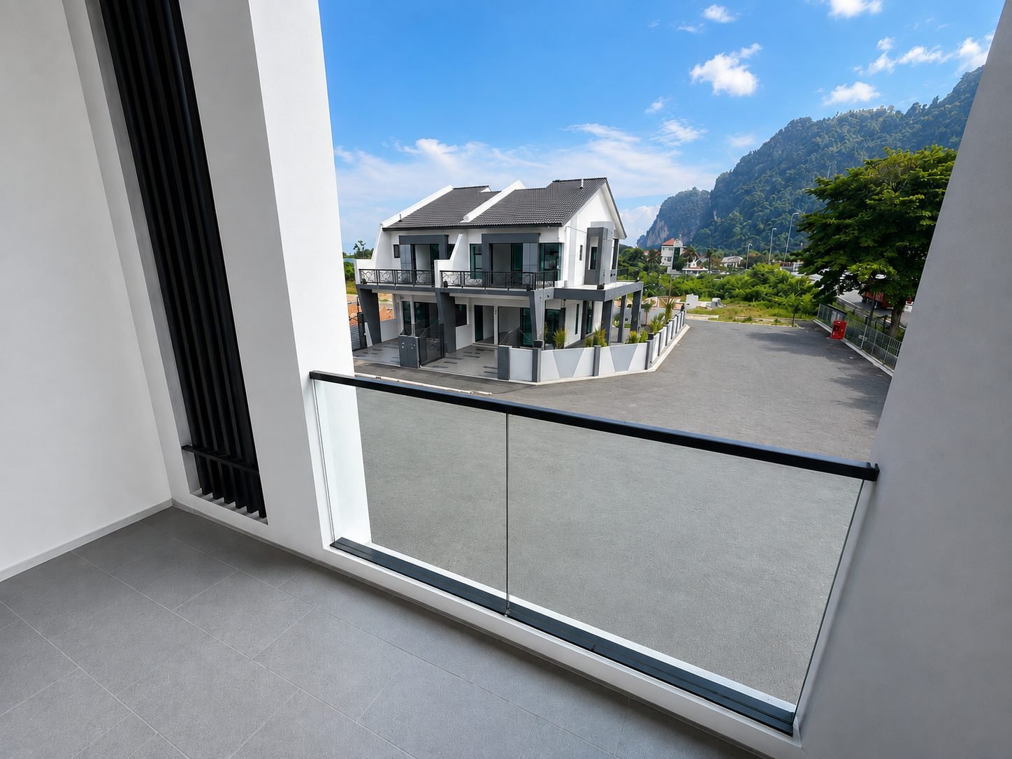 Balcony looking towards the neighbouring house and the limestone hills, Ampang Cove