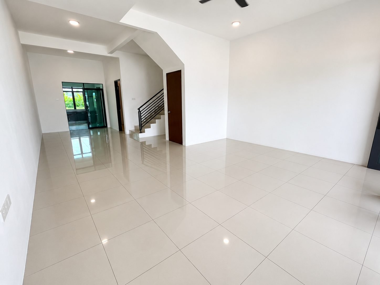 Living area and staircase at the Ampang Cove terrace show house