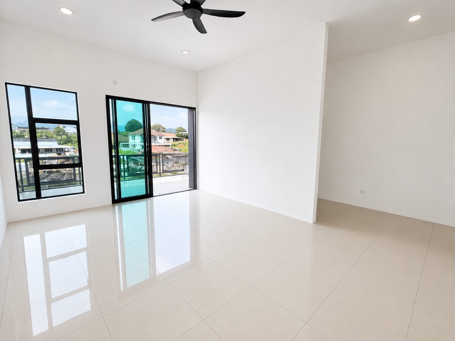 First-floor family area opening onto the balcony, Ampang Cove terrace