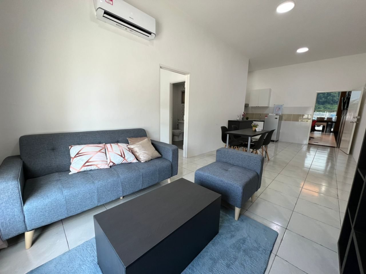 Sofa and lounge area of the 1-bedroom show unit