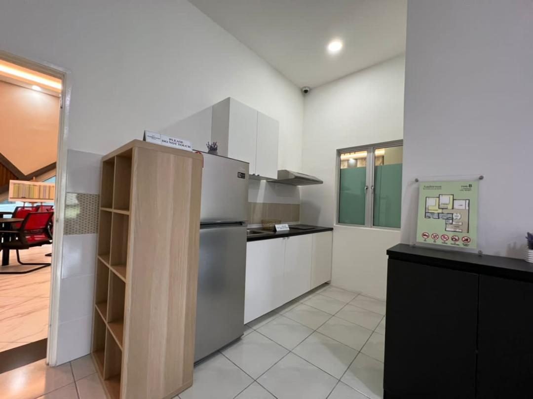Kitchen and dining pass-through in the 2-bedroom show unit