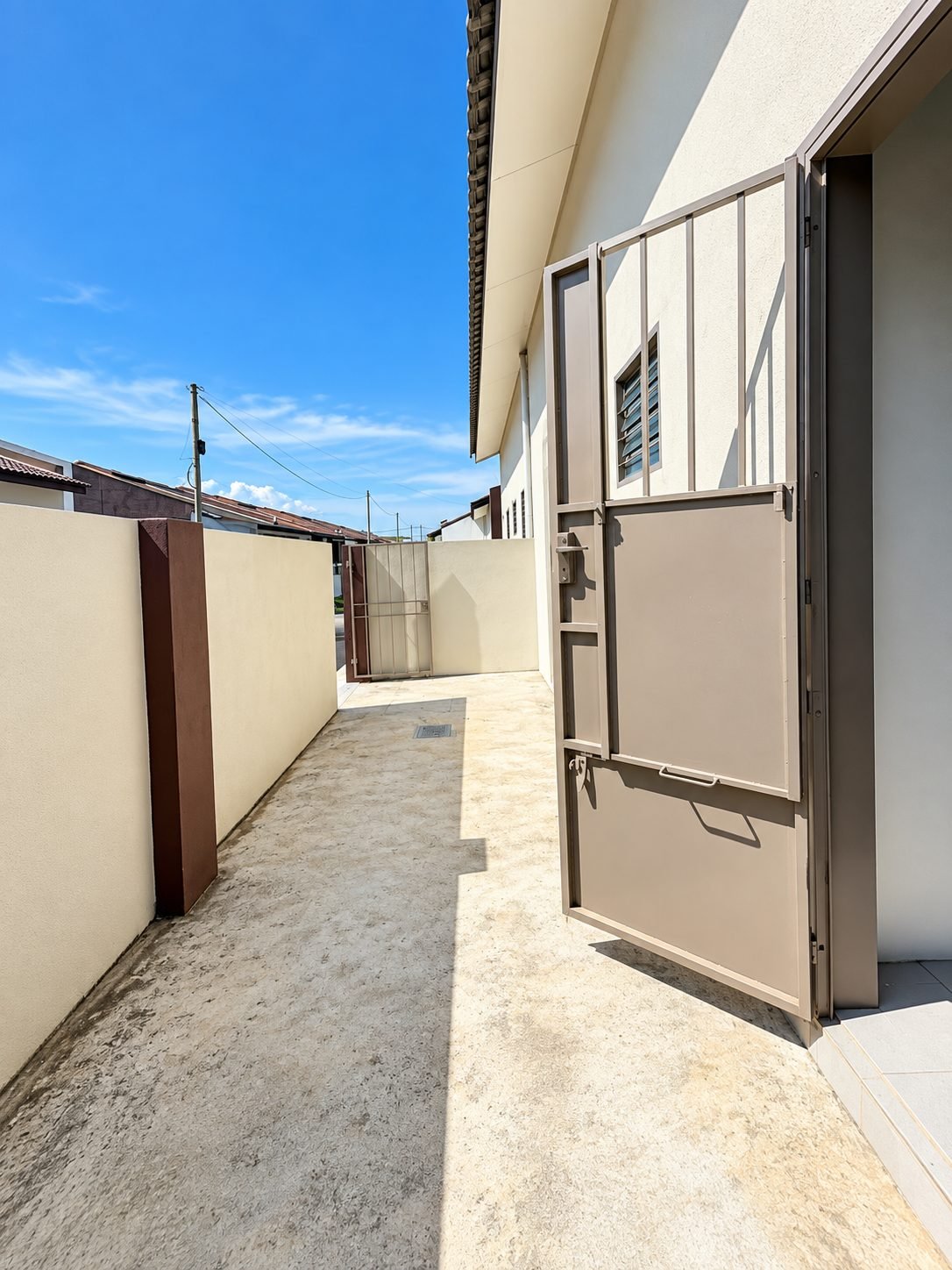 Rear service yard and back gate of the show house at Taman Gopeng Mewah, Gopeng