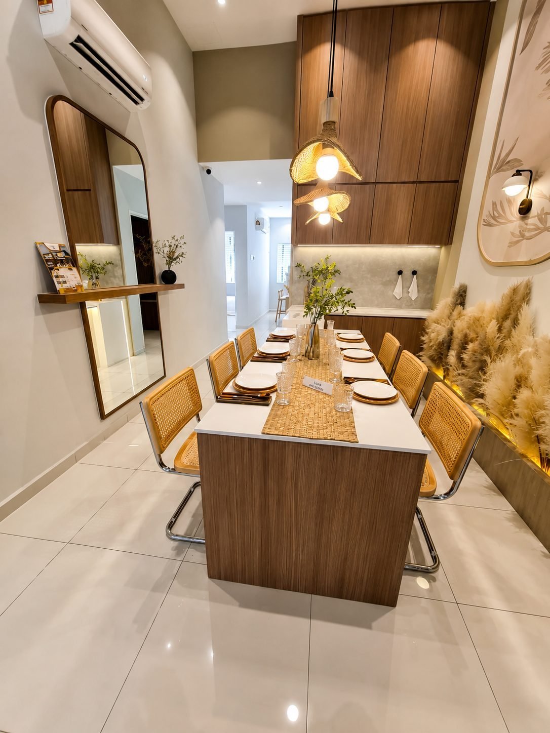 Dining table under pendant lighting with the kitchen behind, Taman Klebang Ria Type A