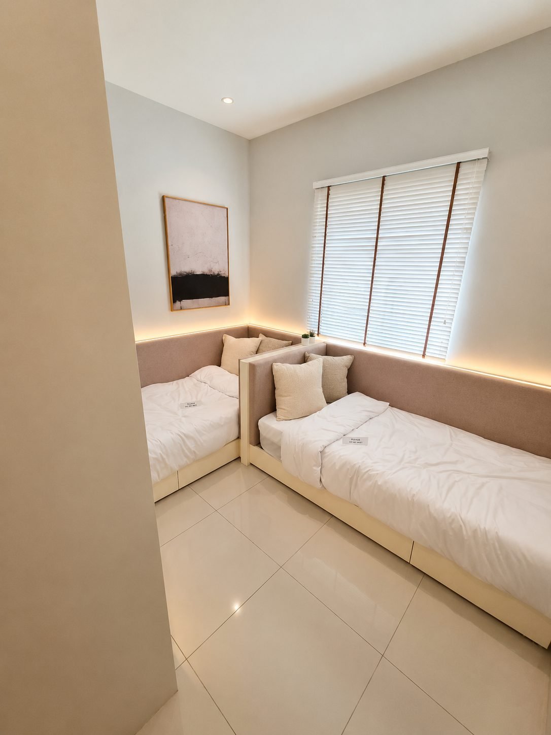 Second bedroom laid out with twin beds, Taman Klebang Ria Type A show unit