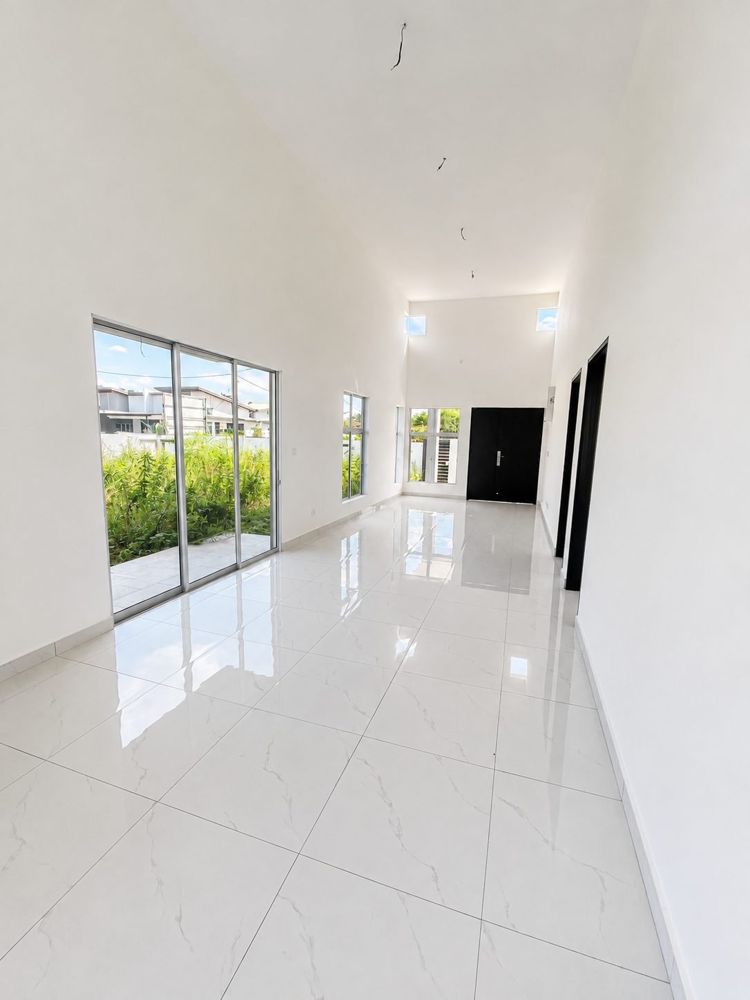 Living area looking towards the rear sliding door, Taman Klebang Ria Type B
