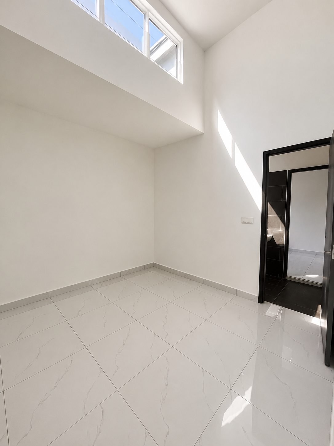 Room with a high clerestory window, Taman Klebang Ria Type B bare unit