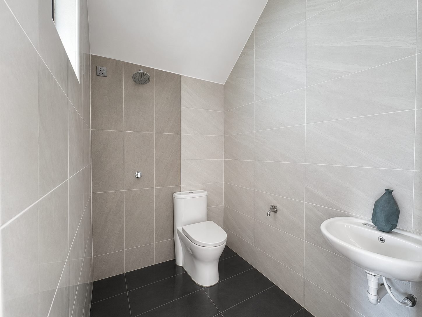 Ground-floor bathroom at the Taman Lapangan Indah show house, Ipoh