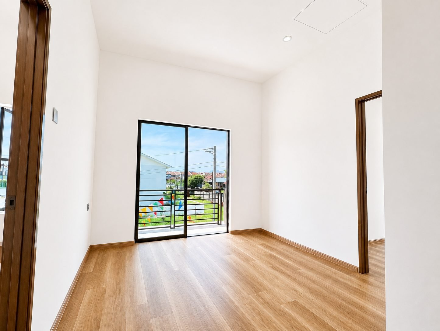 Master bedroom opening onto the balcony, Taman Lapangan Indah show house
