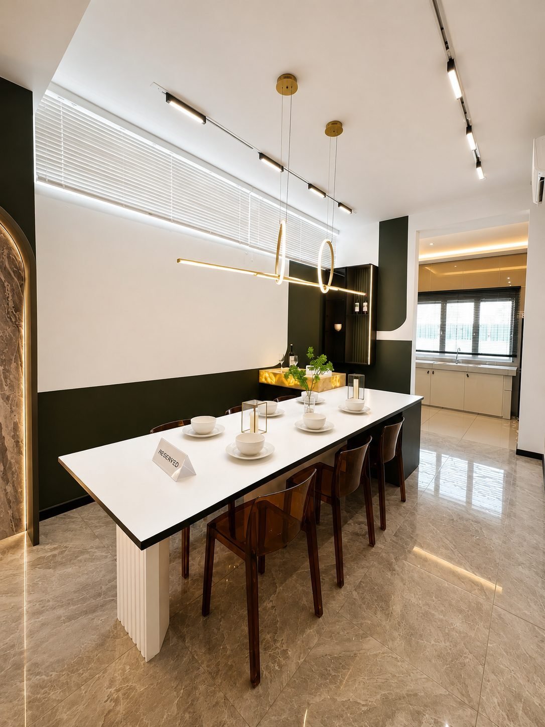 Dining room with a long table under track lighting, Pearl Garden 2-storey
