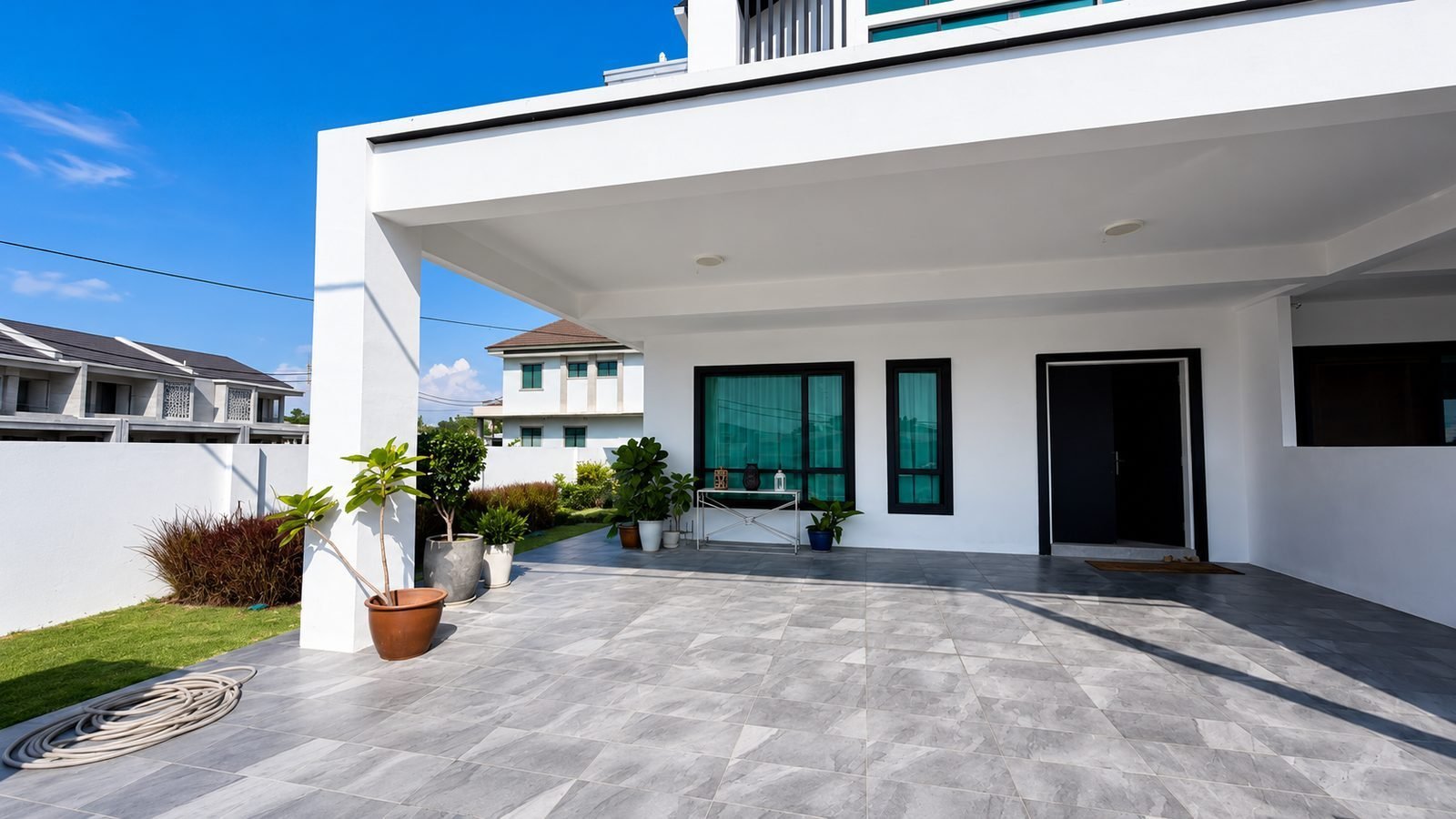 Car porch and front entrance of the Pulai Heights semi-detached show house