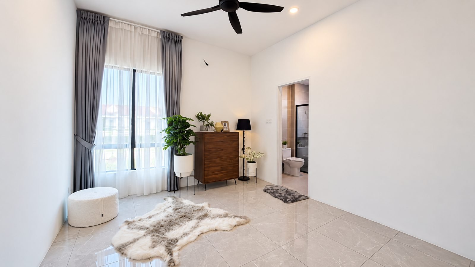 Bedroom with its own bathroom beyond, Pulai Heights semi-detached show house