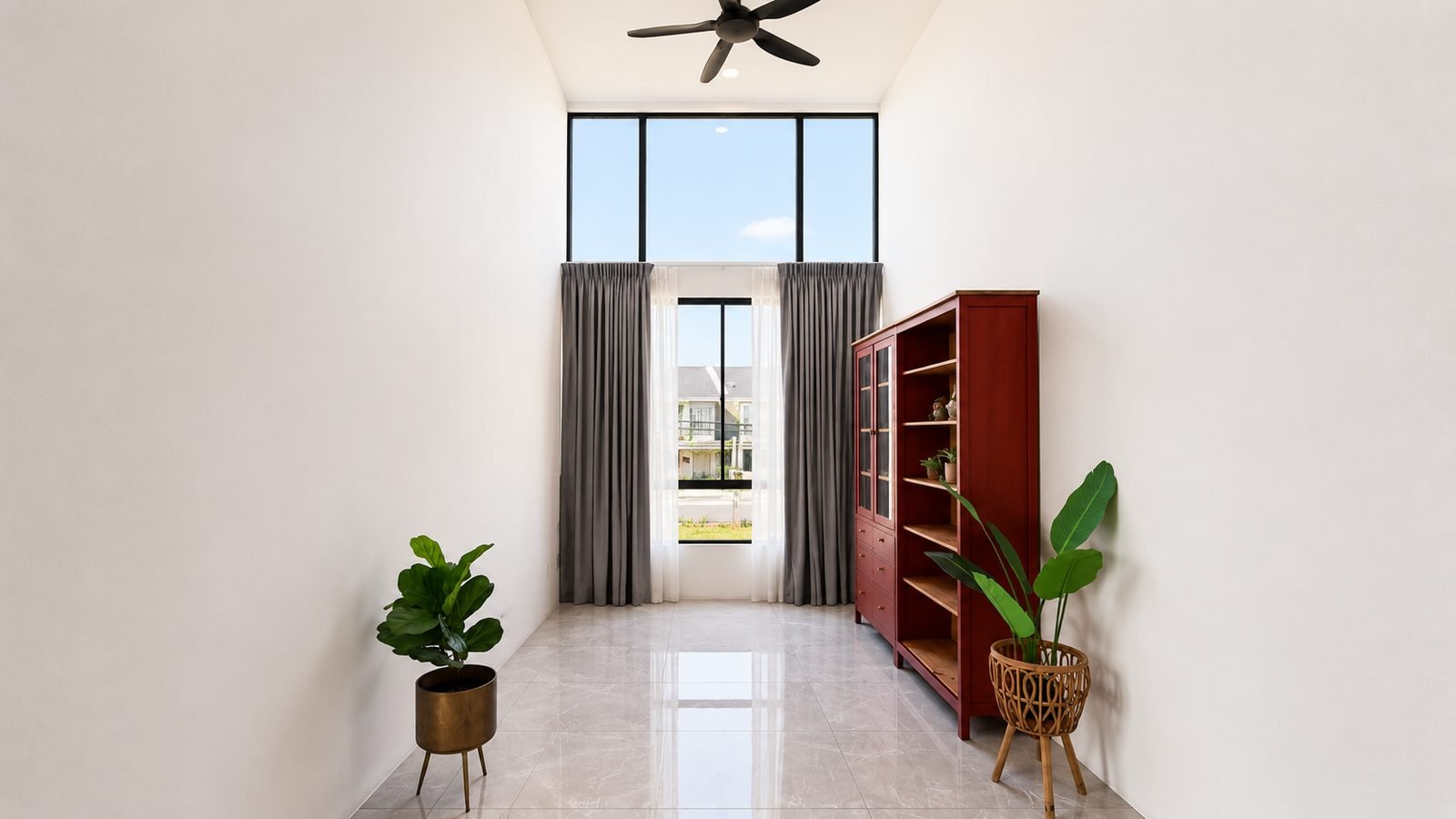 Family area under a tall window, Pulai Heights semi-detached show house