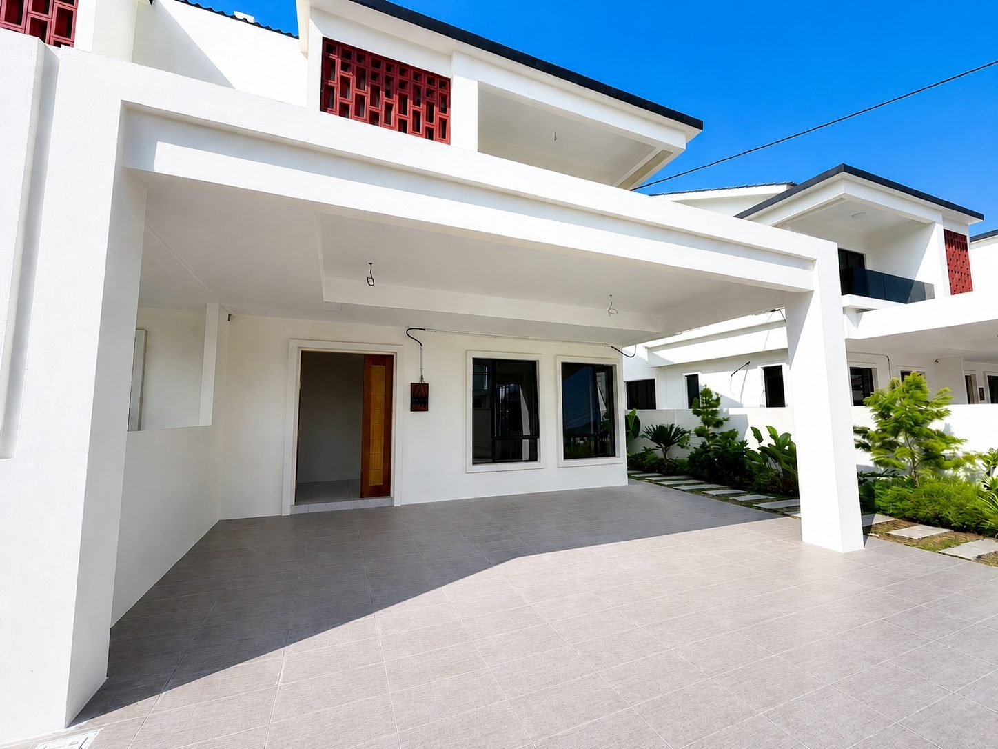 Car porch and front door of the Pulai Heights terrace unit