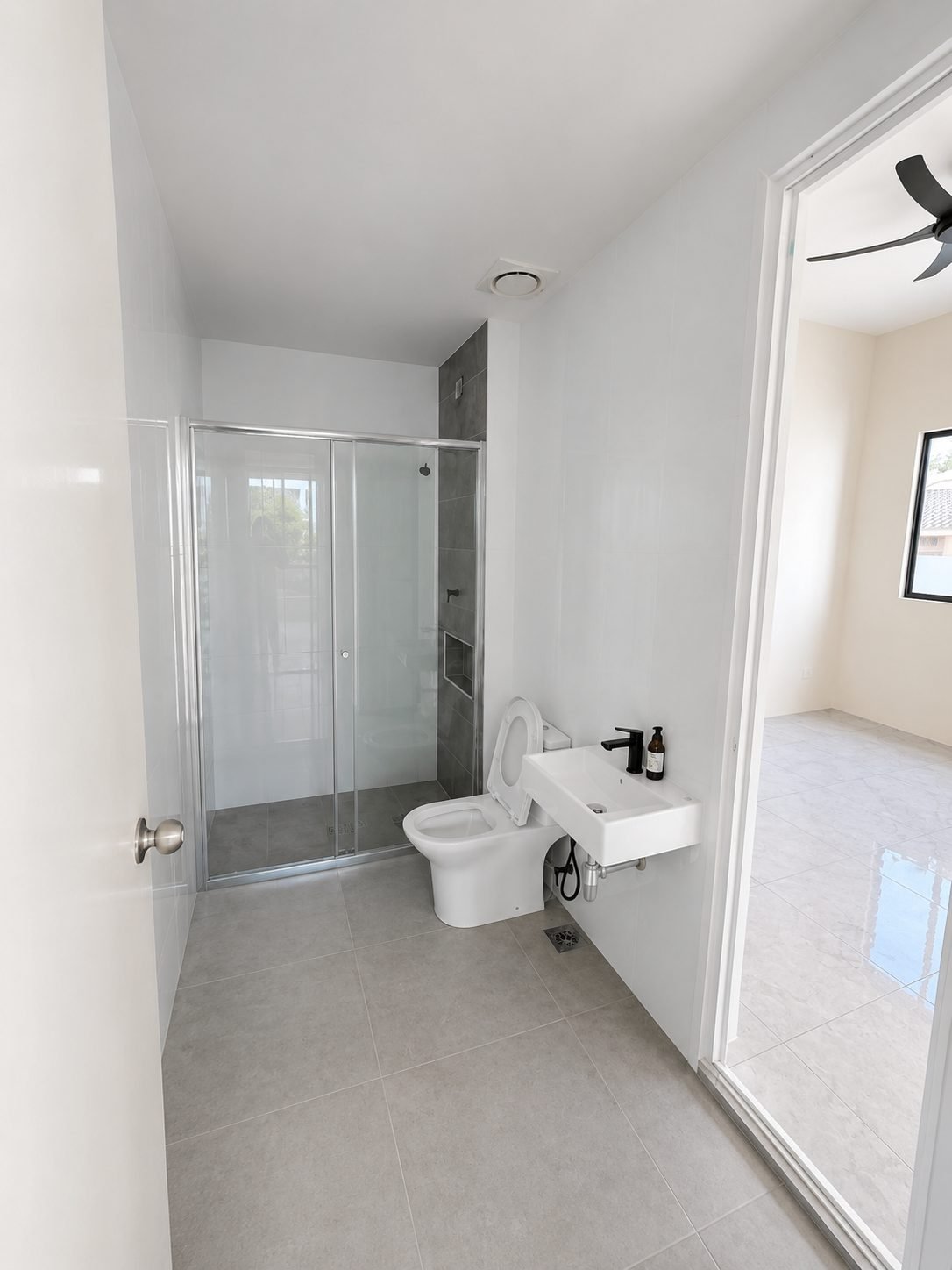 Ground-floor bathroom with a shower screen, Pulai Heights terrace
