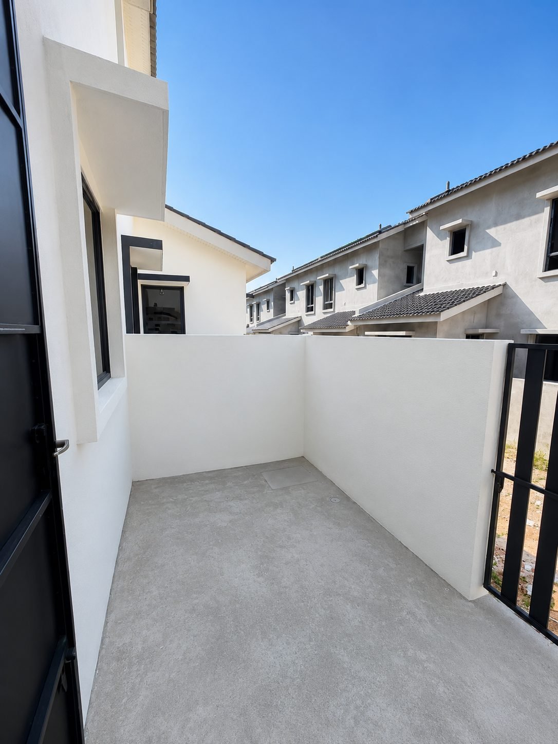 Rear service yard of the Pulai Heights terrace unit