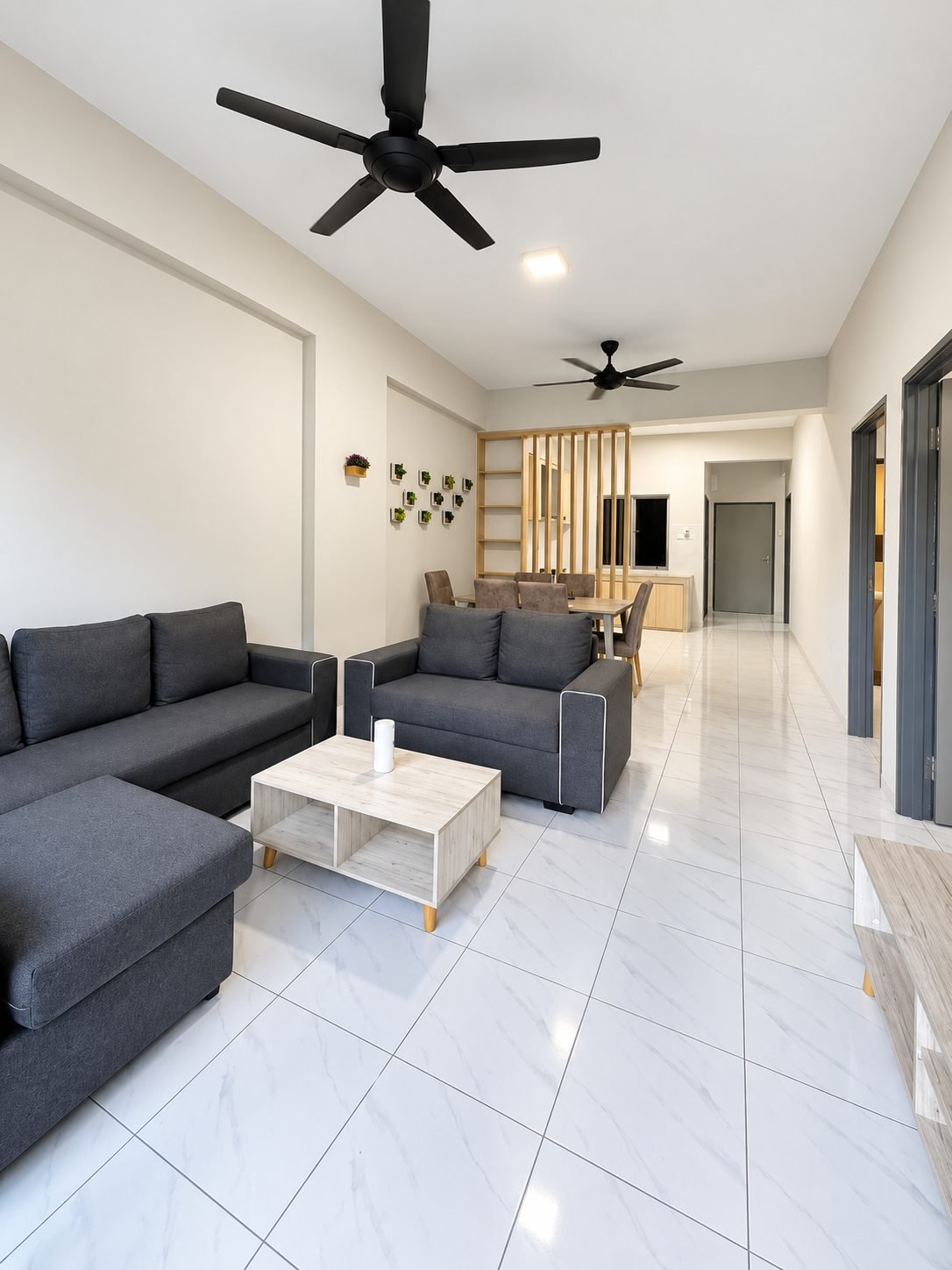 Living area under twin ceiling fans, Type C2 show unit, Pangsapuri Putra Bercham