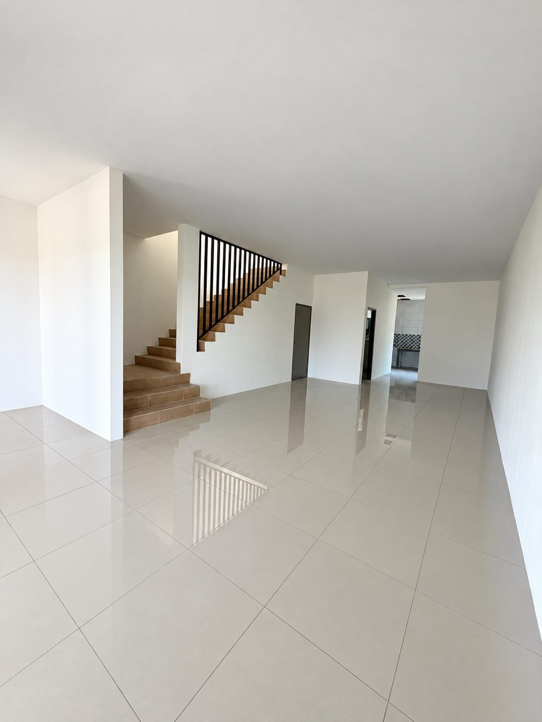 Entrance hall with the staircase beyond, double-storey show house
