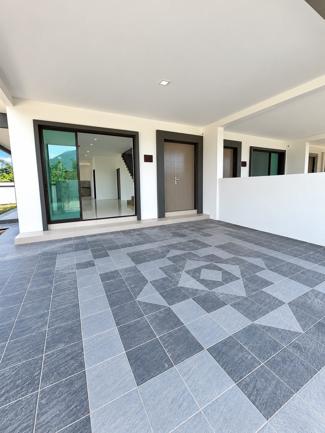 Car porch and sliding entrance door, double-storey show house at Taman Raia Saujana III