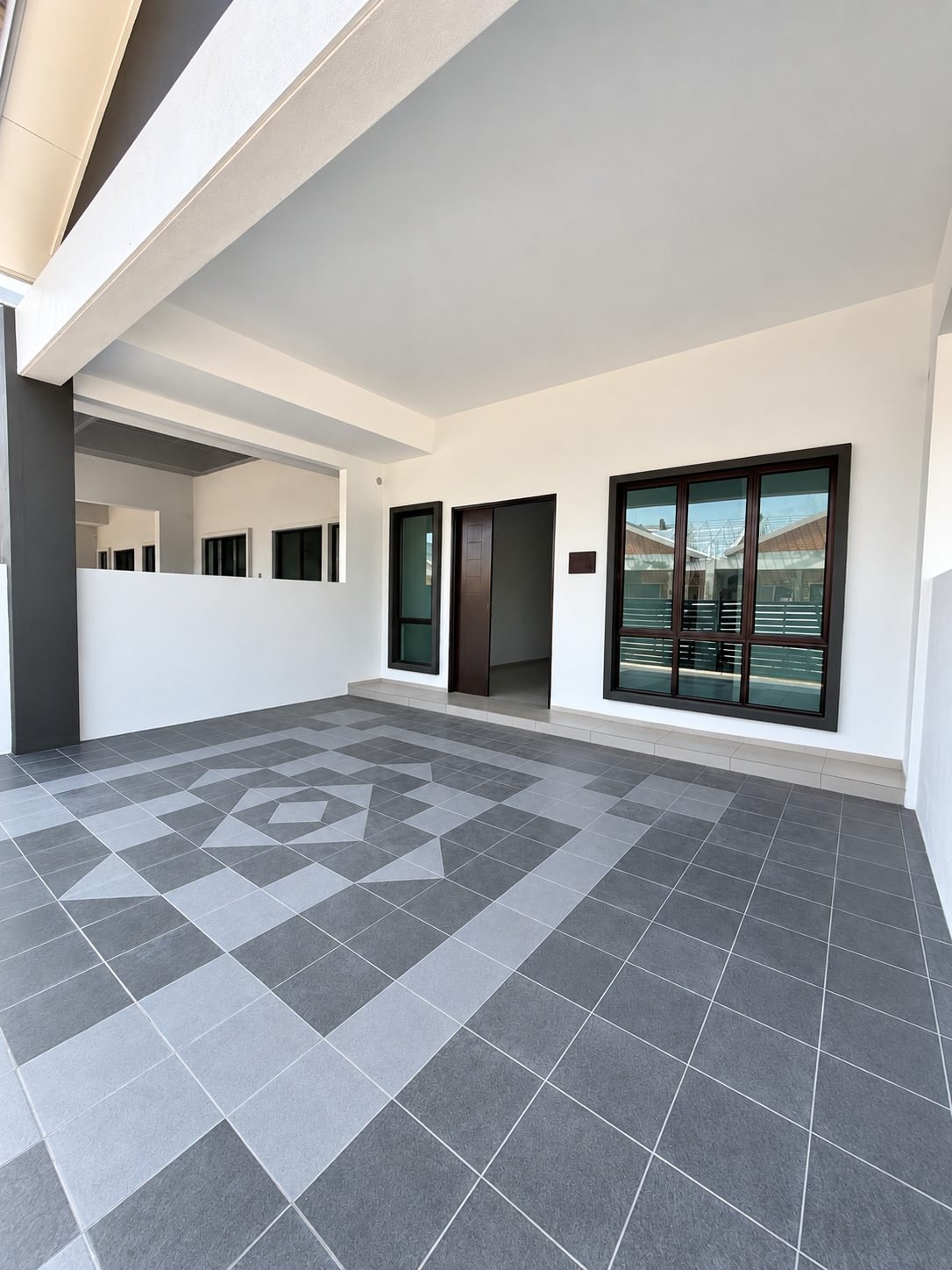 Car porch and sliding entrance door, single-storey show house at Taman Raia Saujana III