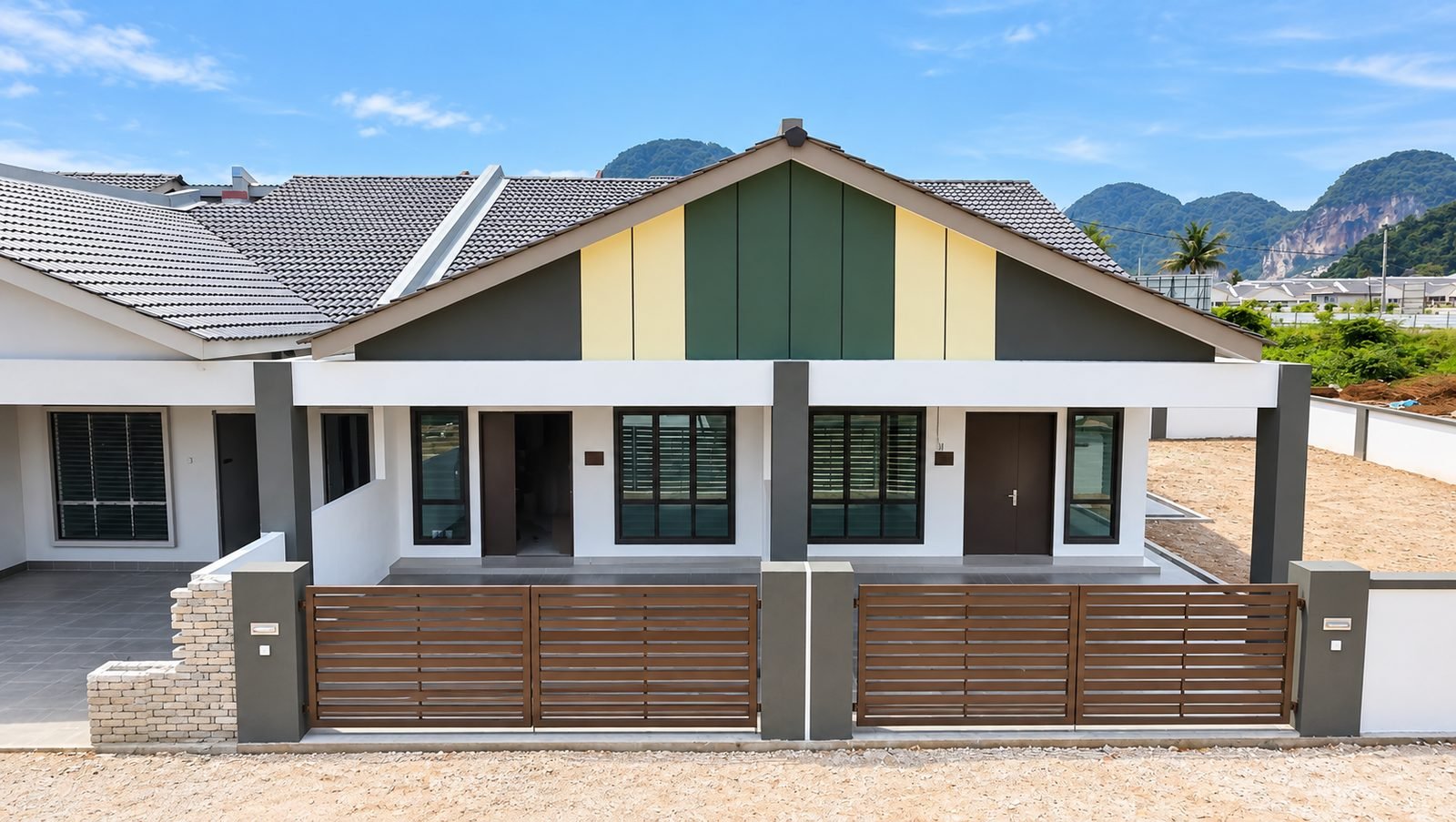 Completed single-storey terrace row at Taman Raia Saujana III, Simpang Pulai, with the limestone hills behind