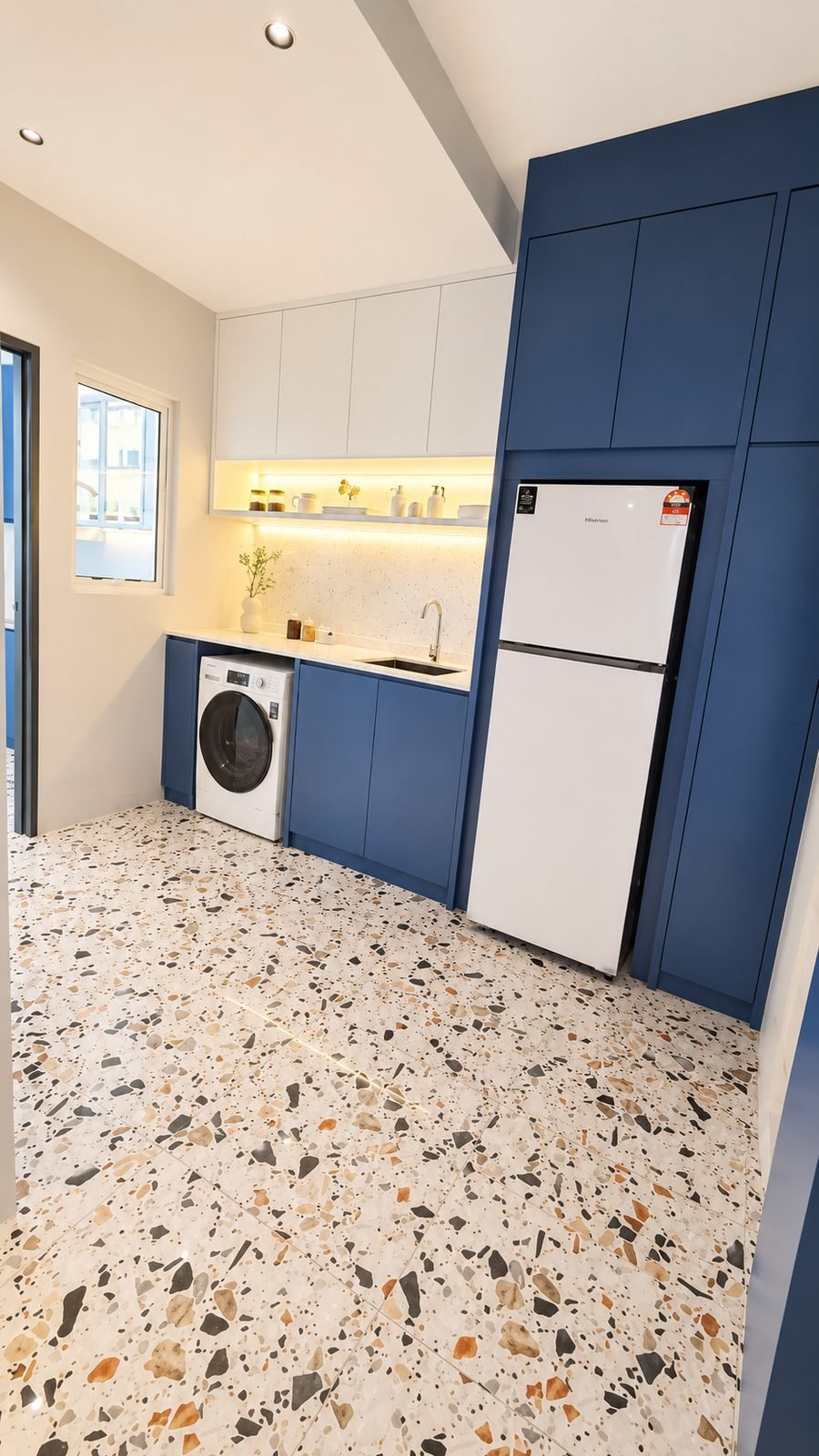 Wet kitchen with washer and fridge in the Type A show unit at Santorini @ Botani, Ipoh