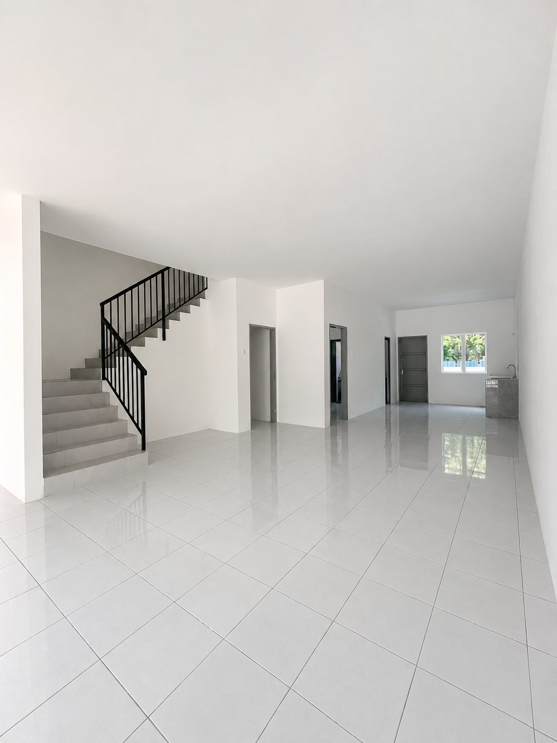 Living hall and staircase as the house hands over, Silver Valley Gardens