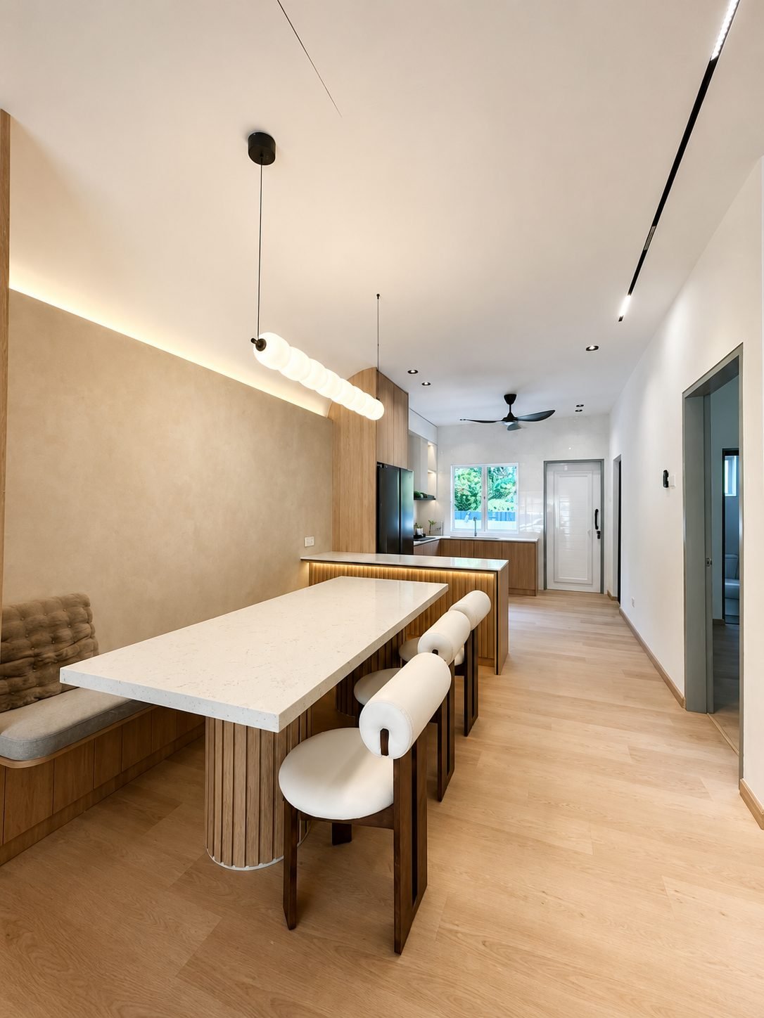 Dining area with a built-in bench and pendant lighting, Silver Valley Gardens show house