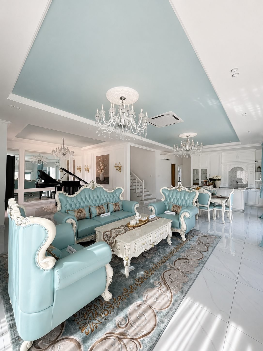 Living hall seating with the staircase beyond, Thompson Prestige show house